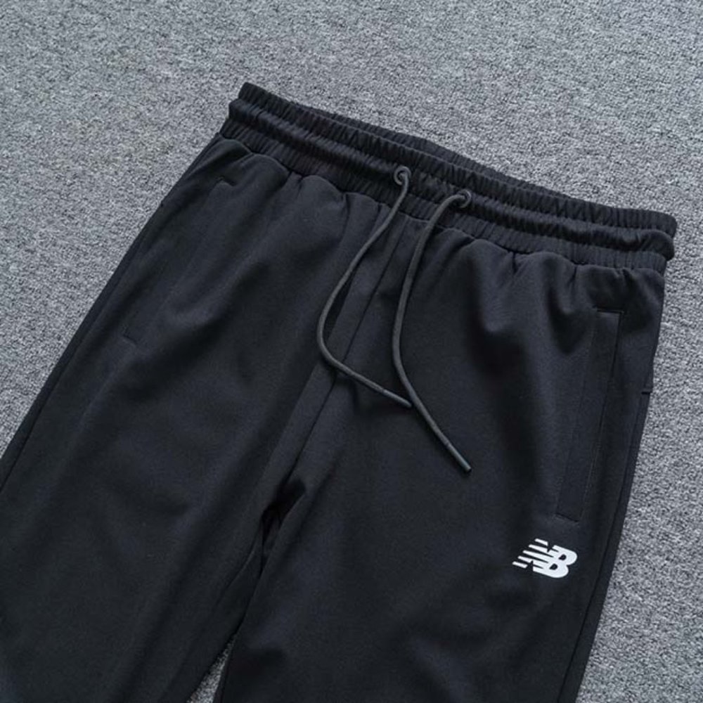 New Balance NB Logo Print Lounge Pants In Black